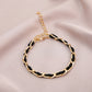 1 Dozen Black/Gold Bracelet